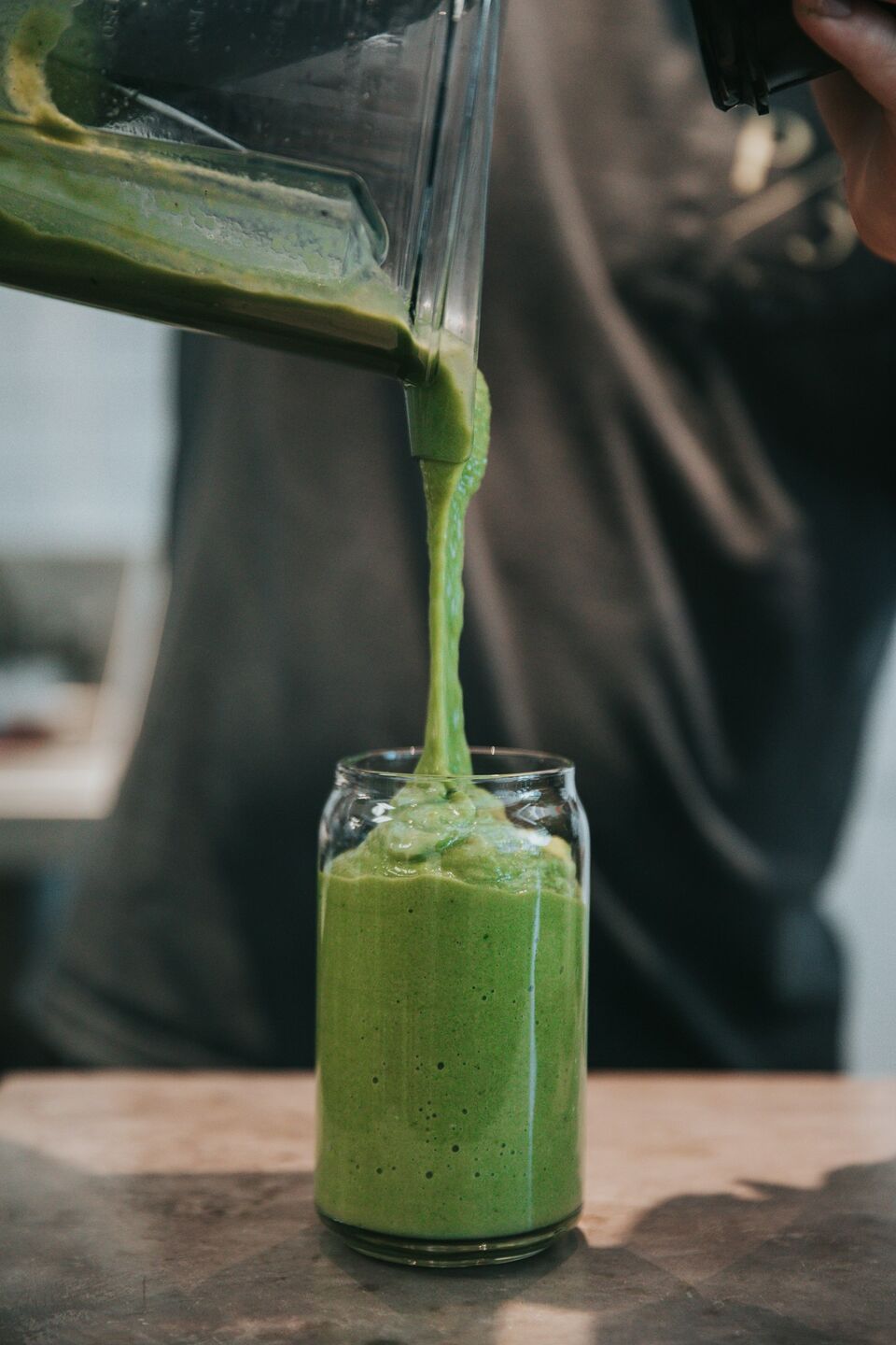 Customer holding a fresh green juice